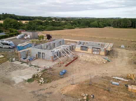 Aerial view of the blockwork walls rising at the Breeze site